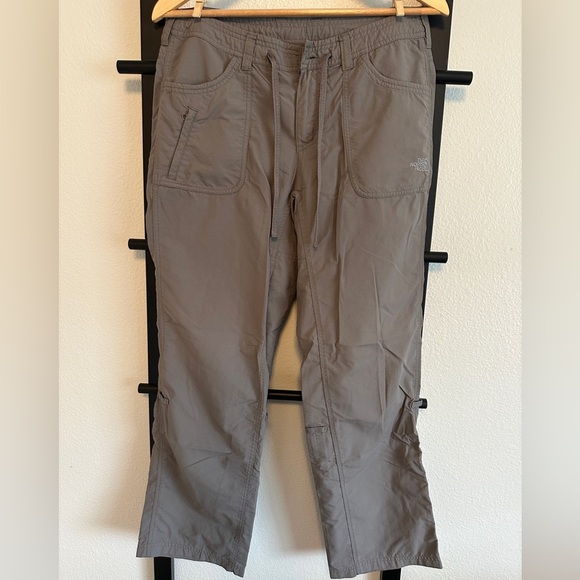 Adjustable hiking pant. Like new condition but missing button as shown. - Picture 1 of 10